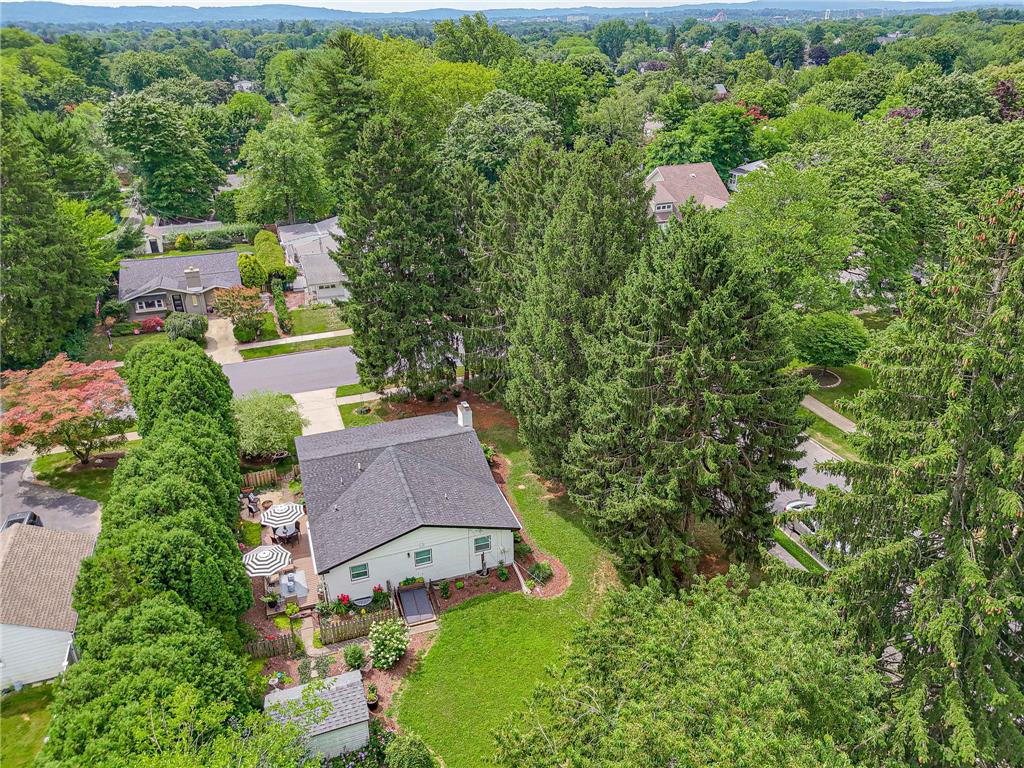 2741 West Livingston Street Allentown, PA 18104 - Photo 49 of 51 An aerial perspective reveals a charming home nestled among lush trees with a spacious lawn and inviting patio.