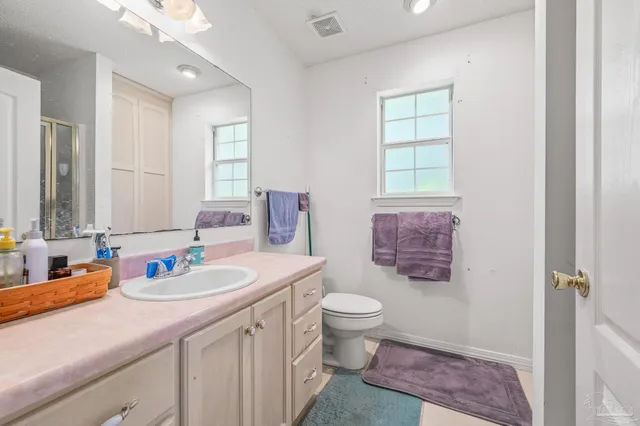 a bathroom with a toilet