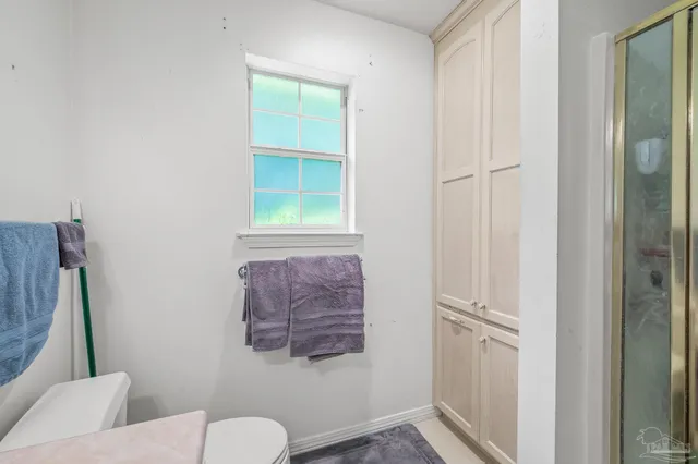 a view of backyard with seating area