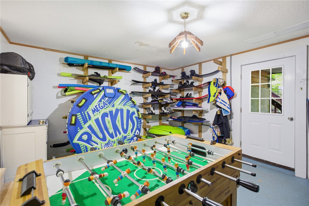110 Snug Harbor Road Seneca, SC 29678 - Photo 23 of 37 This versatile recreation room offers ample storage and entertainment for active living.