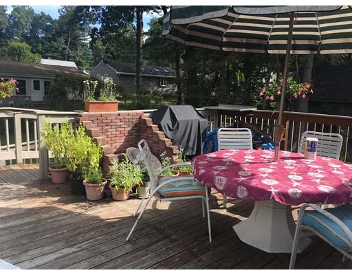 44 Colorado Street Springfield, MA 01118 - Photo 3 of 12 a patio with a table and chairs