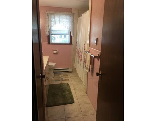 44 Colorado Street Springfield, MA 01118 - Photo 8 of 12 a bathroom with a sink and a shower