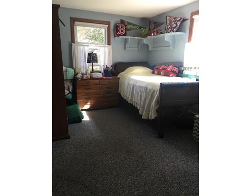 44 Colorado Street Springfield, MA 01118 - Photo 10 of 12 a bedroom with a bed and a window