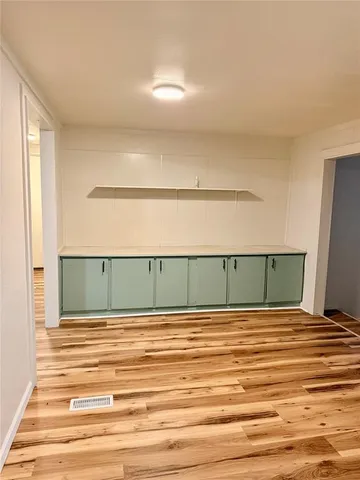 a room with a bed and a window