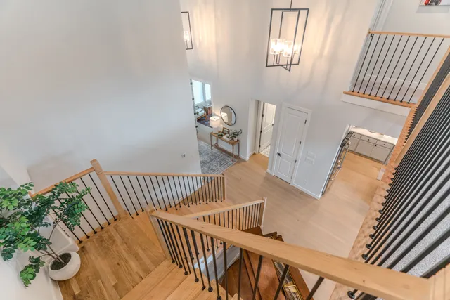 a view of a house with swimming pool and sitting area