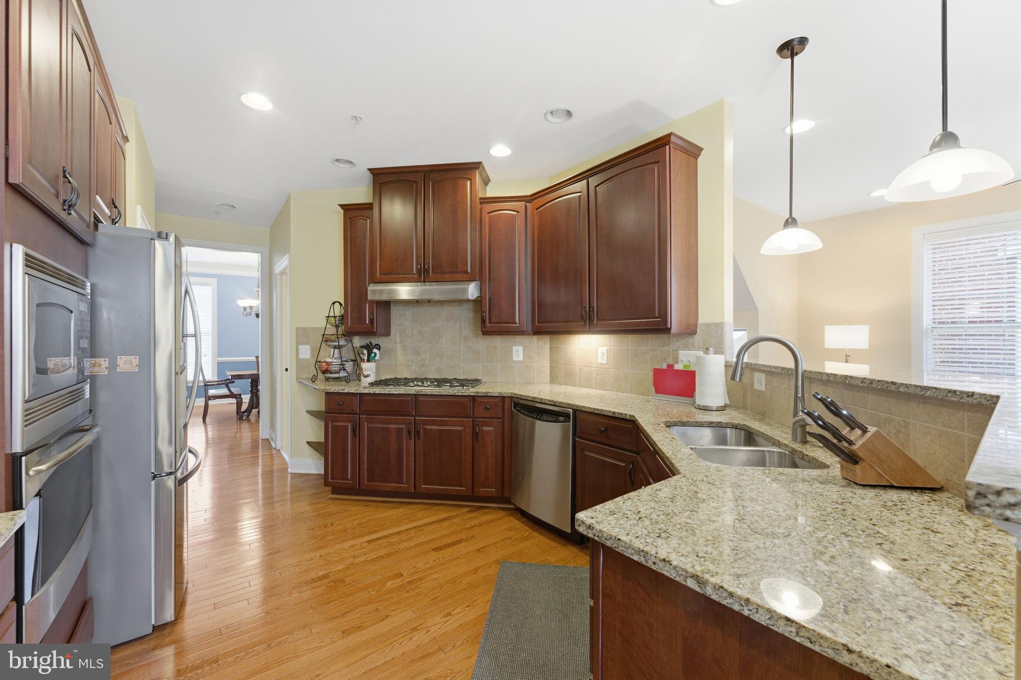 7611 Elmcrest Road Hanover, MD 21076 - Photo 18 of 64 Modern kitchen with elegant finishes.