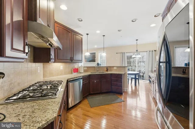 a view of a chair and table in the balcony