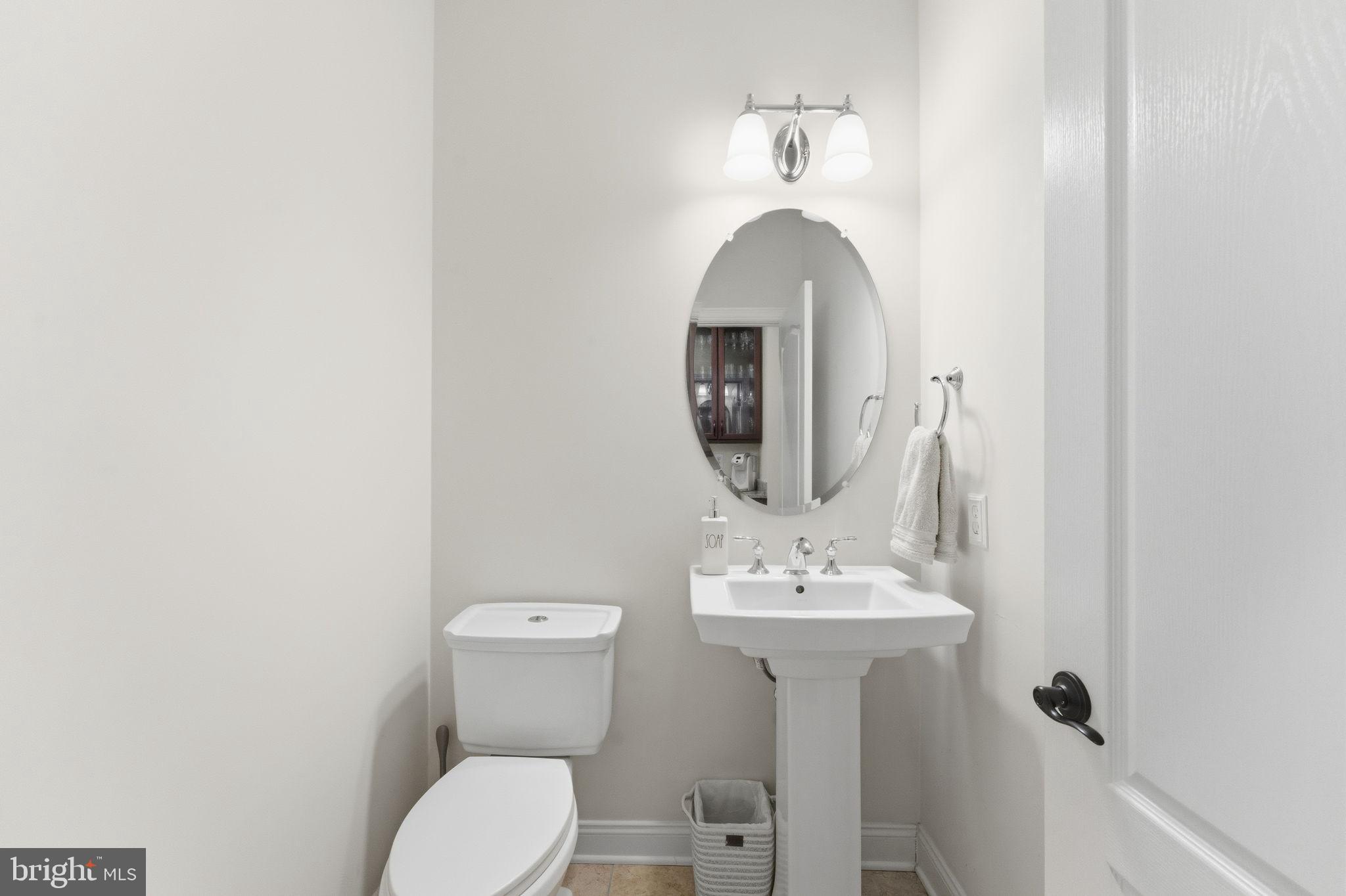 7611 Elmcrest Road Hanover, MD 21076 - Photo 21 of 64 Elegant half-bath with modern fixtures.