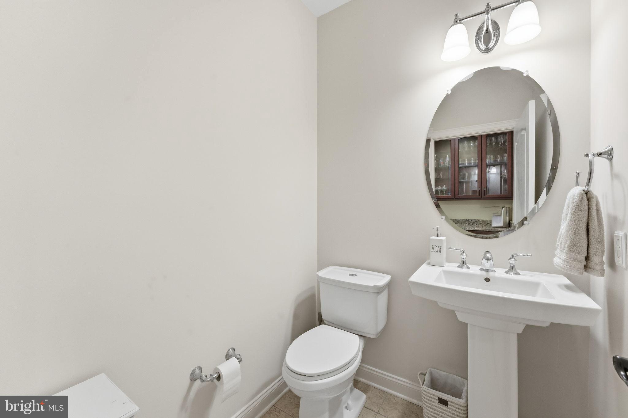 7611 Elmcrest Road Hanover, MD 21076 - Photo 22 of 64 Sleek and modern half-bath retreat.