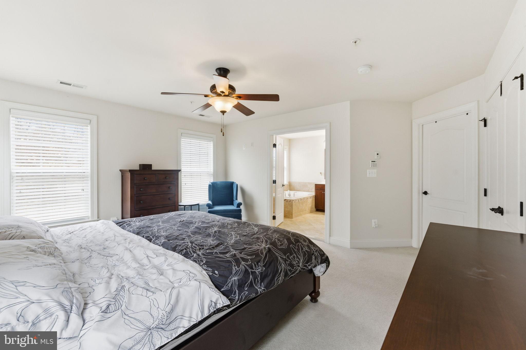7611 Elmcrest Road Hanover, MD 21076 - Photo 27 of 64 Serene bedroom with natural light and style.