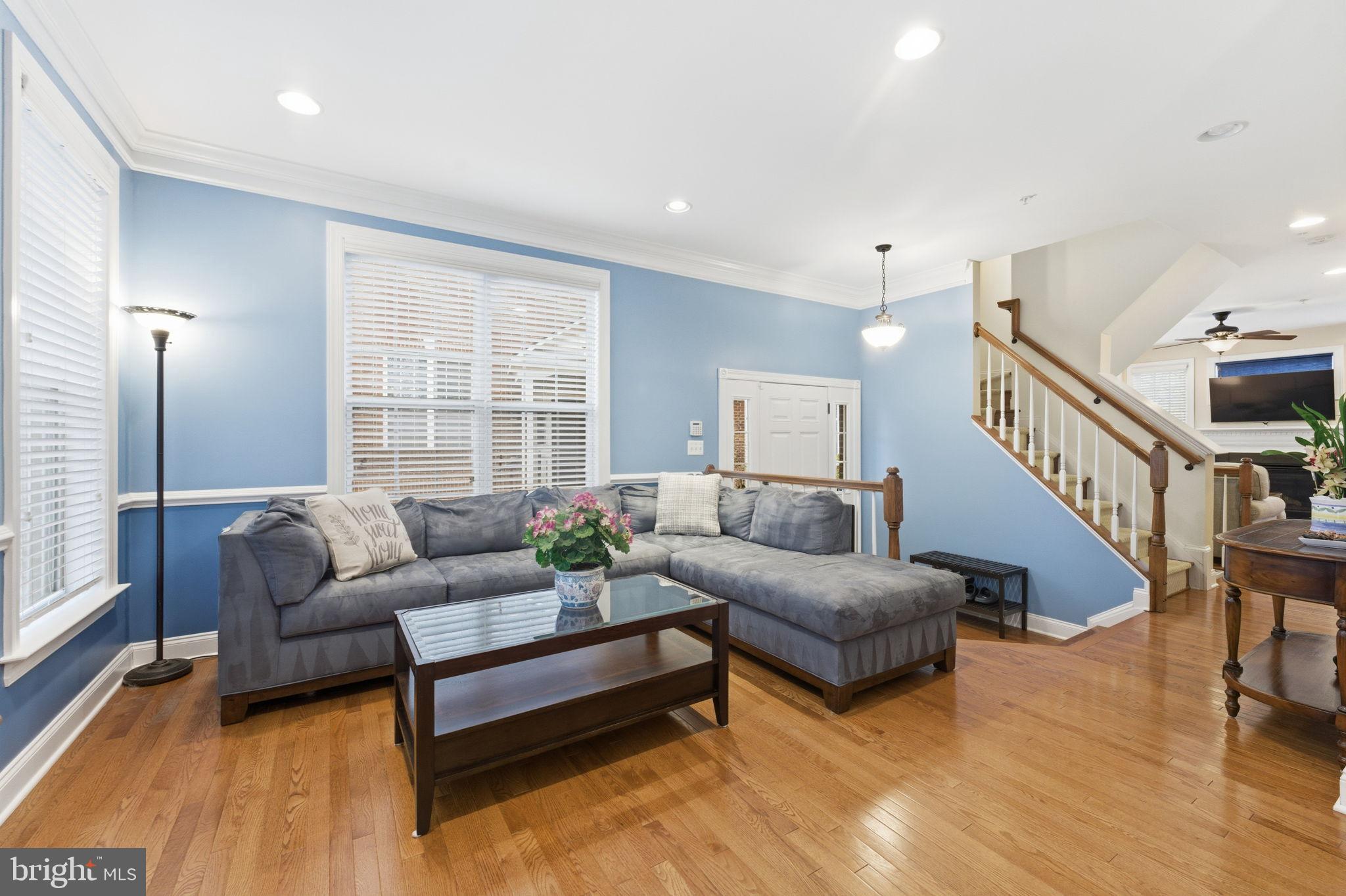 7611 Elmcrest Road Hanover, MD 21076 - Photo 3 of 64 Inviting living space with serene blue hues.