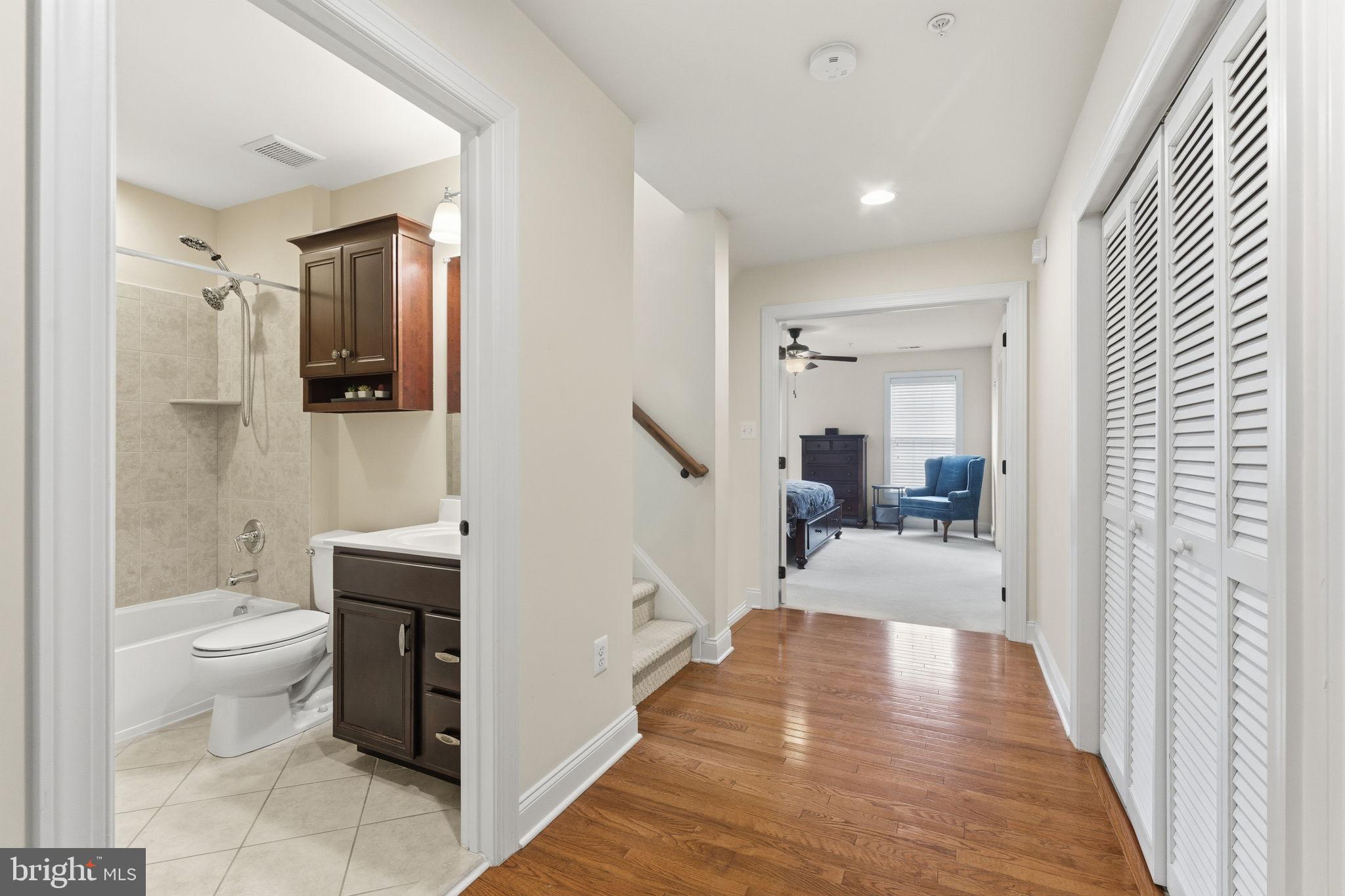 7611 Elmcrest Road Hanover, MD 21076 - Photo 33 of 64 Modern hallway leading to inviting spaces.