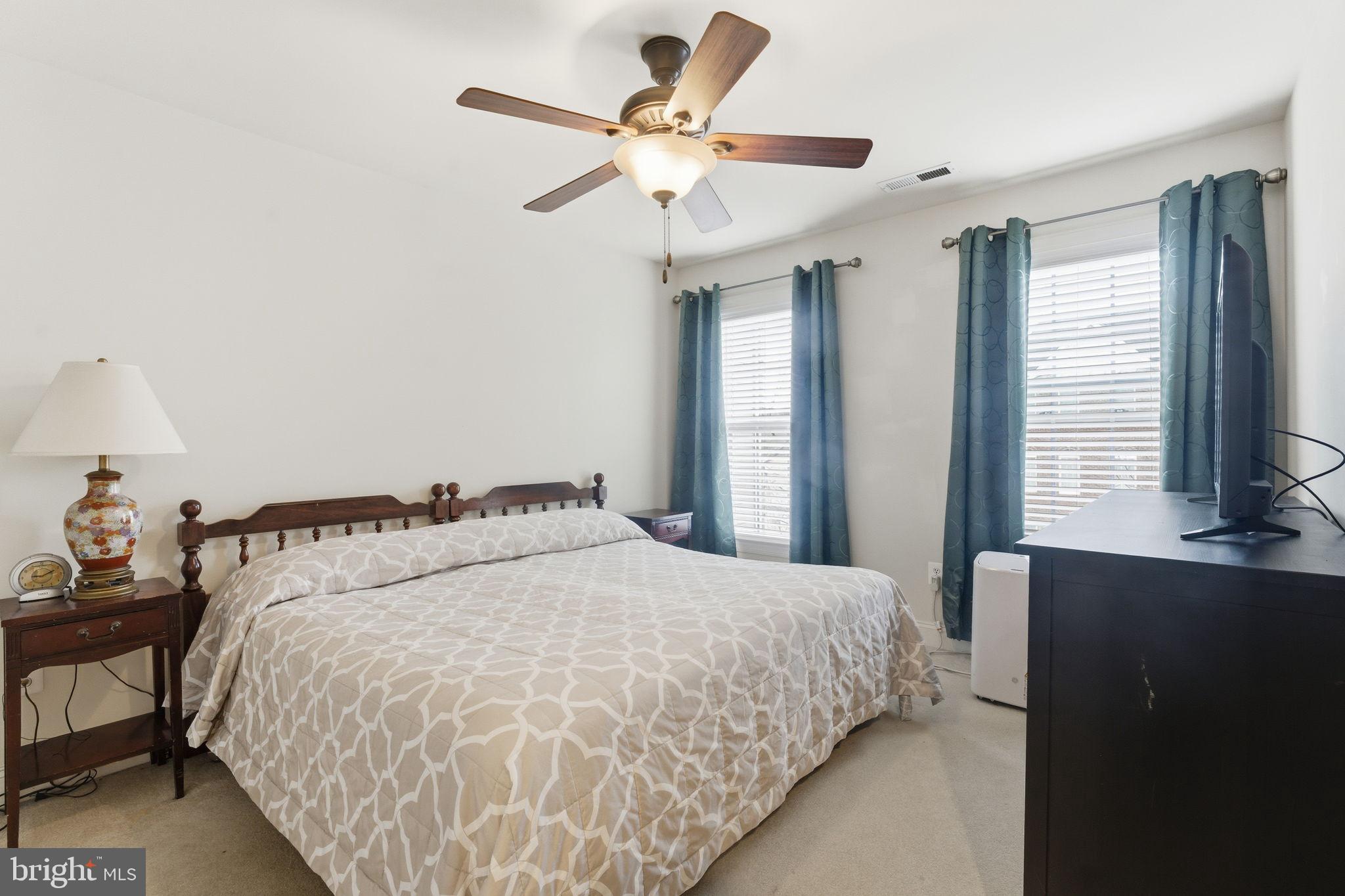 7611 Elmcrest Road Hanover, MD 21076 - Photo 35 of 64 Cozy bedroom with natural light and charm.