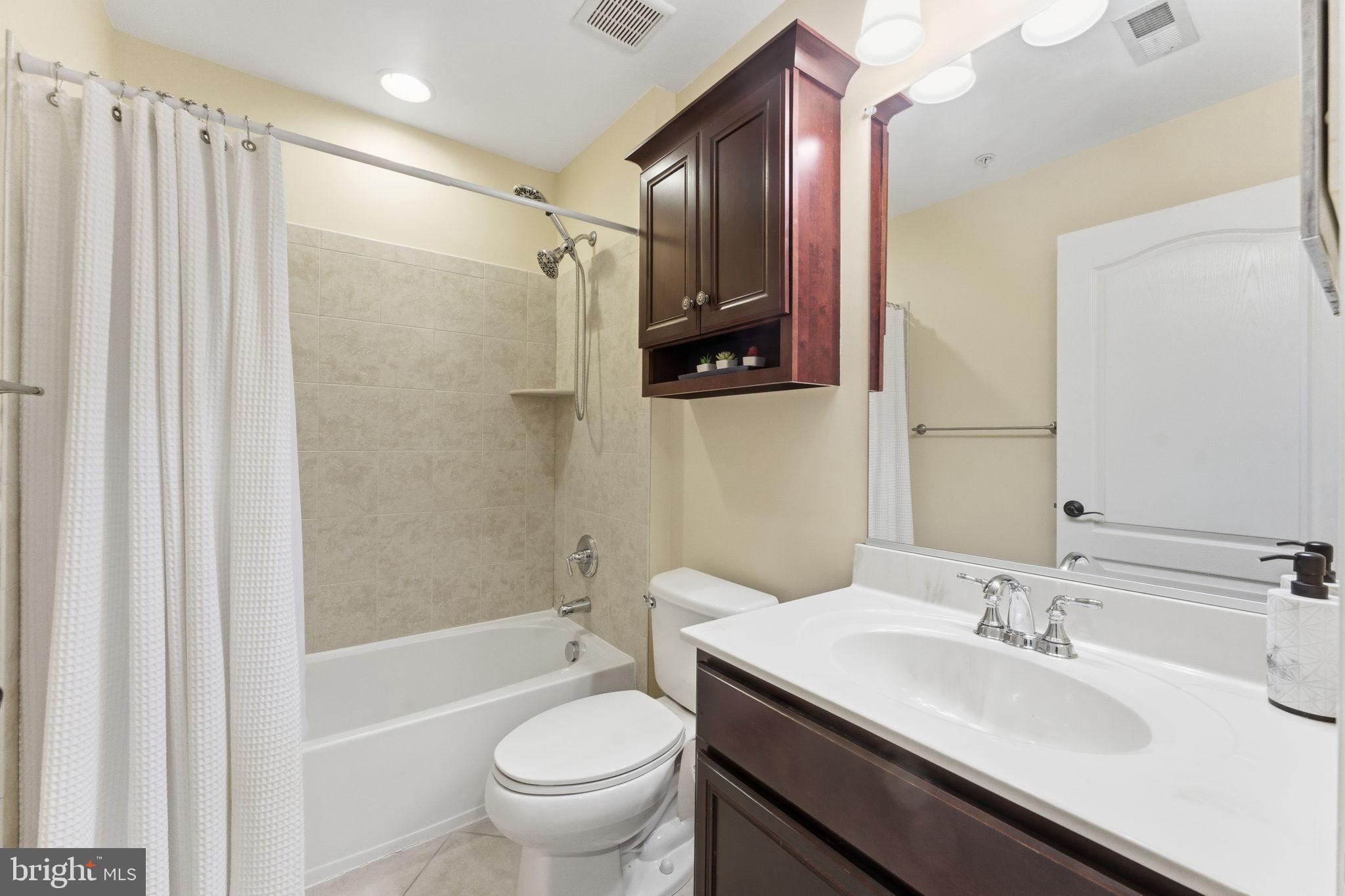 7611 Elmcrest Road Hanover, MD 21076 - Photo 40 of 64 Modern bathroom with elegant finishes.
