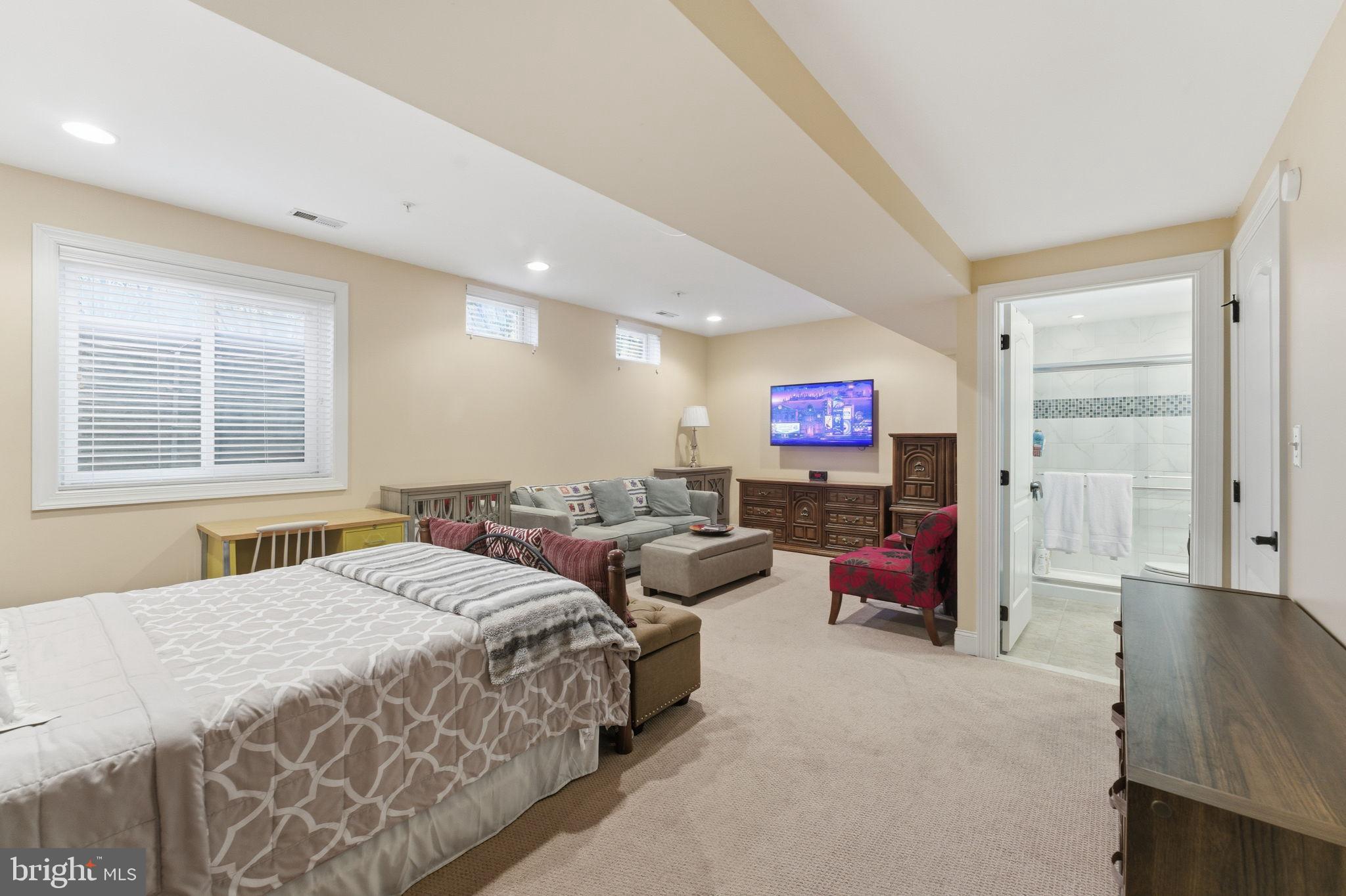 7611 Elmcrest Road Hanover, MD 21076 - Photo 49 of 64 Spacious basement retreat with modern amenities.