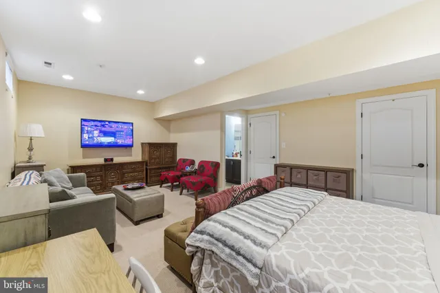 a swimming pool view with a outdoor seating space