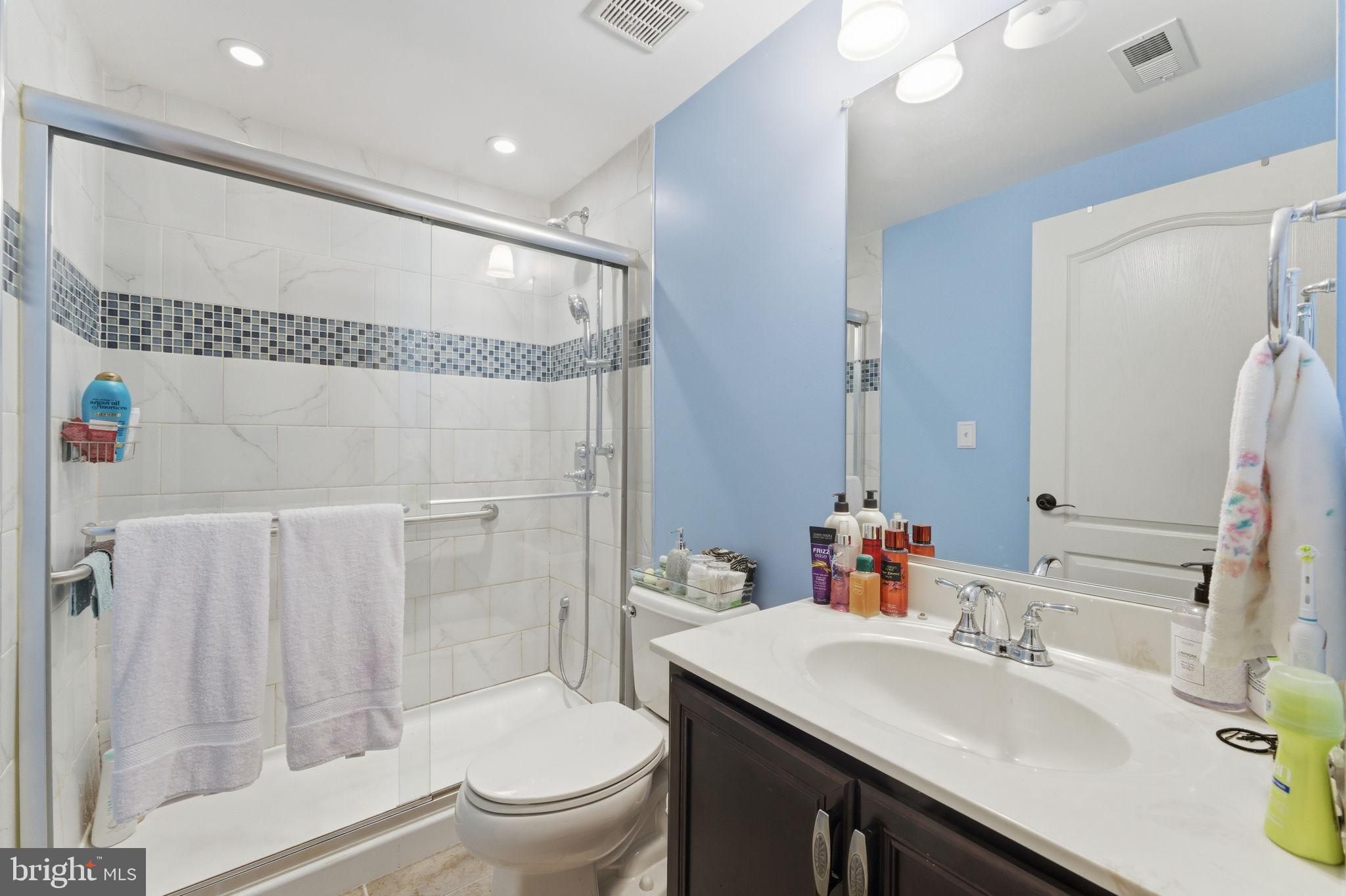 7611 Elmcrest Road Hanover, MD 21076 - Photo 53 of 64 Basement bathroom with sleek finishes.