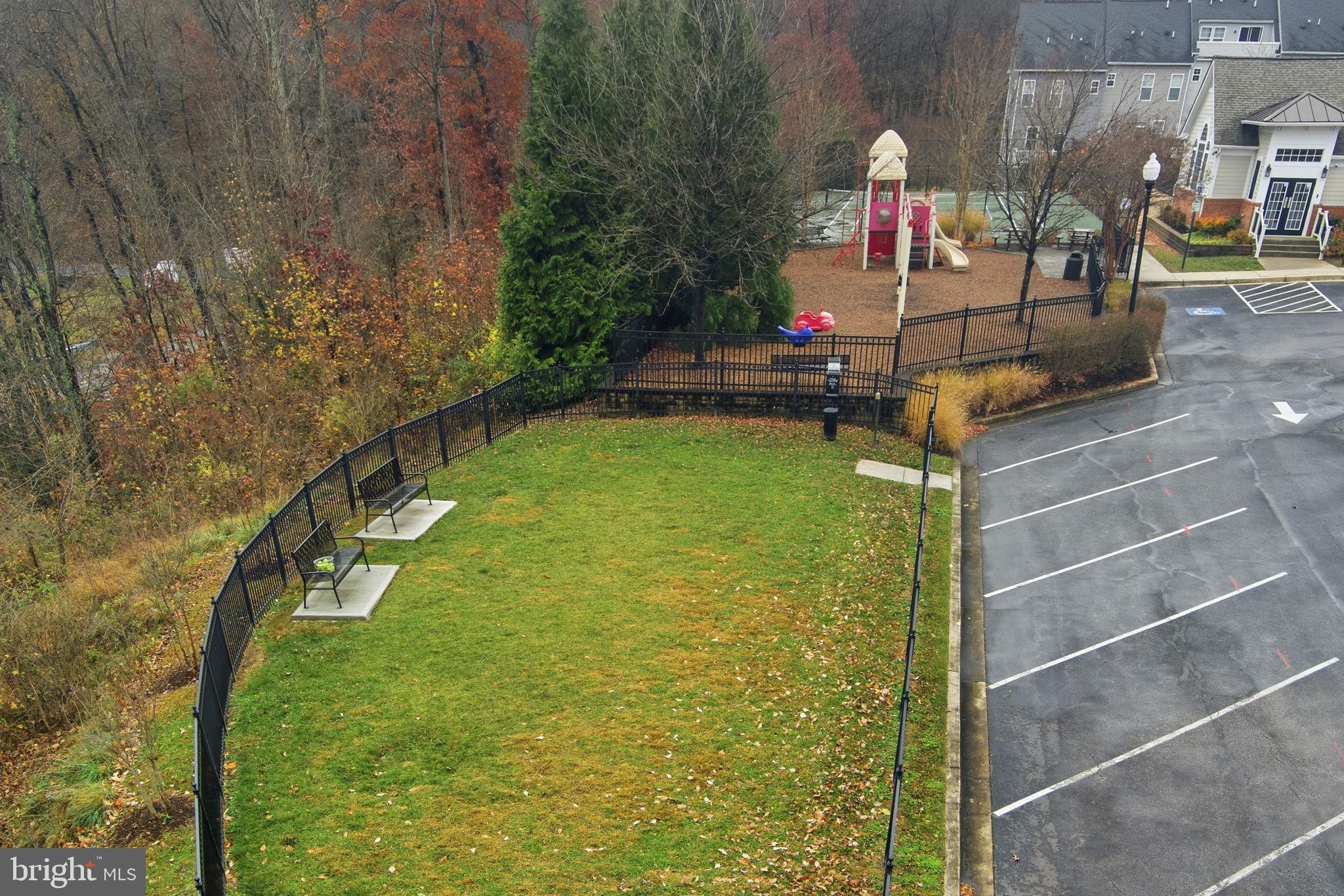 7611 Elmcrest Road Hanover, MD 21076 - Photo 64 of 64 Tranquil green space with playground nearby.