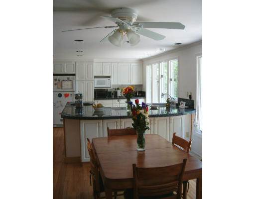 135 Red Gate Lane Amherst, MA 01002 - Photo 10 of 15 a view of a dining room with furniture and window