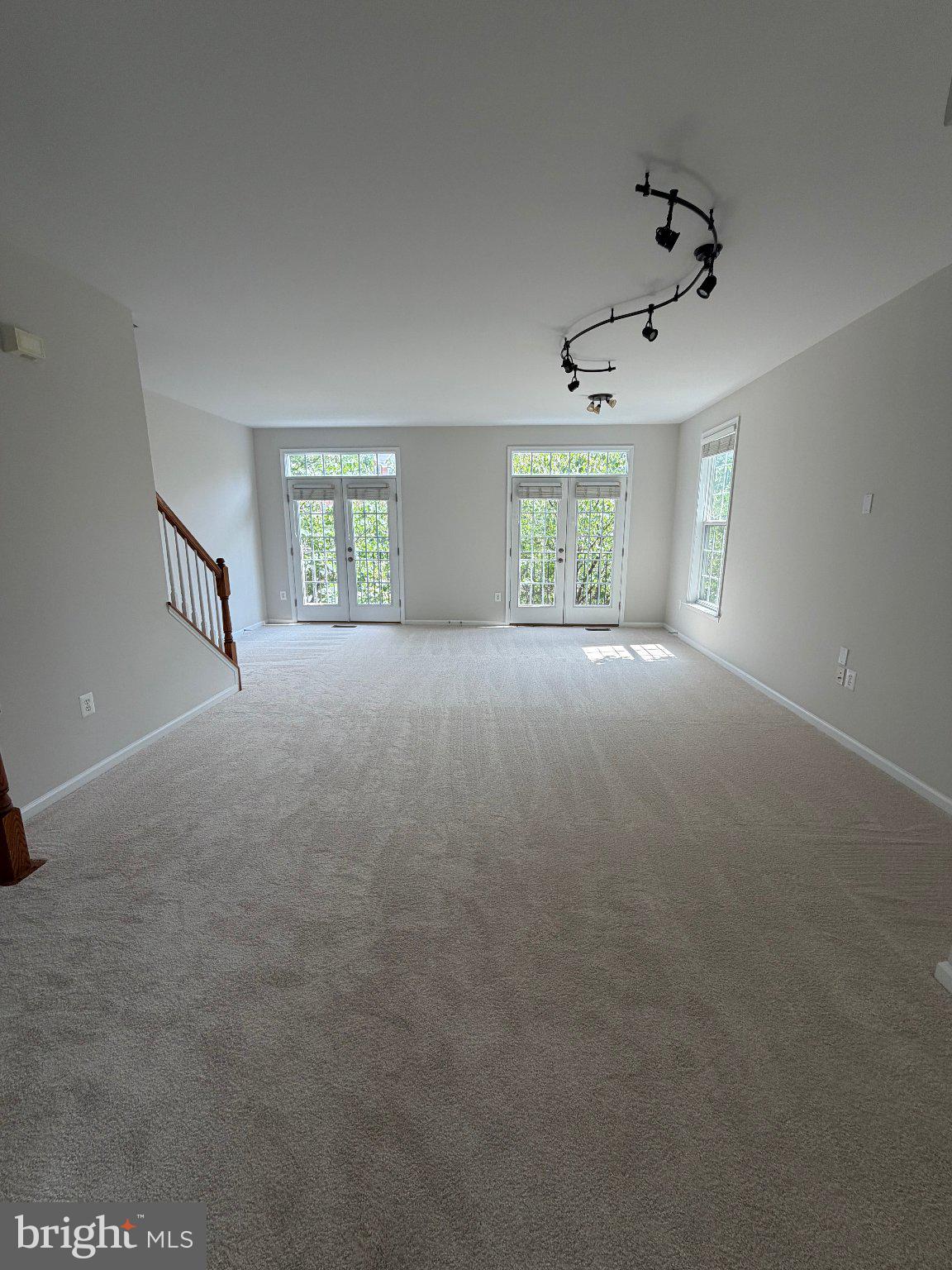 42724 Redpath Terrace Ashburn, VA 20147 - Photo 2 of 14 Spacious, sunlit living area awaits.
