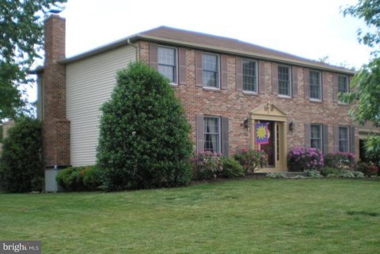 3116 Newcastle Lane Riva, MD 21140 - Photo 1 of 23 a front view of house with yard and green space