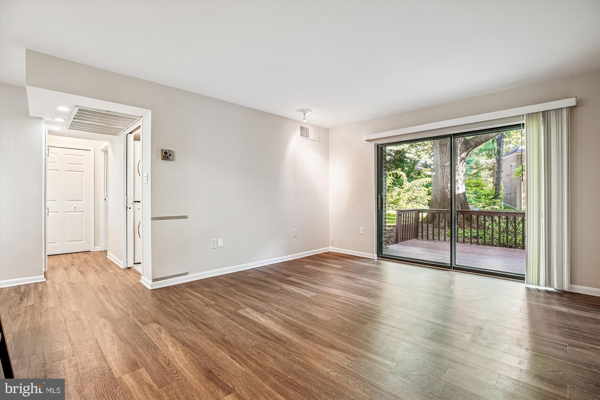 17800 Buehler Road, Unit 1D4 Olney, MD 20832 - Photo 3 of 20 Livingroom, Patio & Hallway to Bedrooms