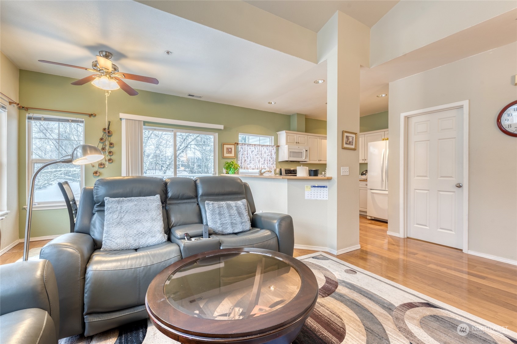 4700 Talbot Road South, Unit 400G Renton, WA 98055 - Photo 5 of 20 a living room with furniture and a wooden floor