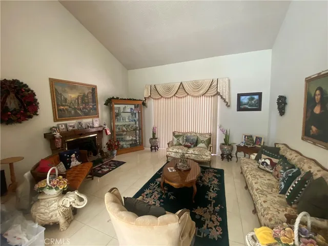 a bedroom with a bed and a potted plant