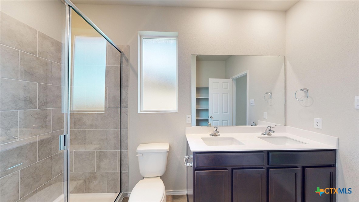 1110 Stone Vly Road Temple, TX 76502 - Photo 9 of 21 a bathroom with a sink toilet and shower