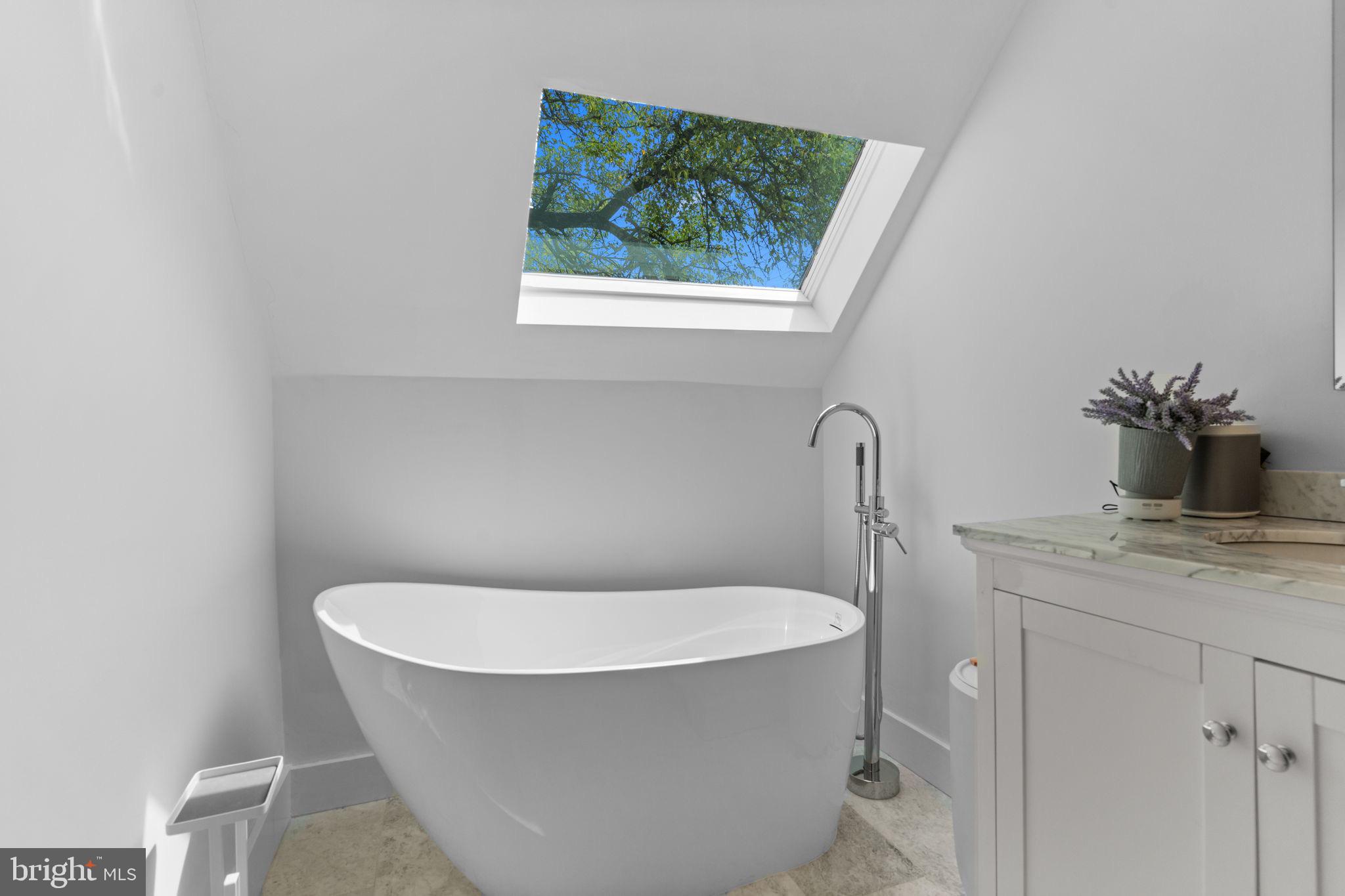 496 East King Road Malvern, PA 19355 - Photo 20 of 35 Serene bathroom with skylight views.