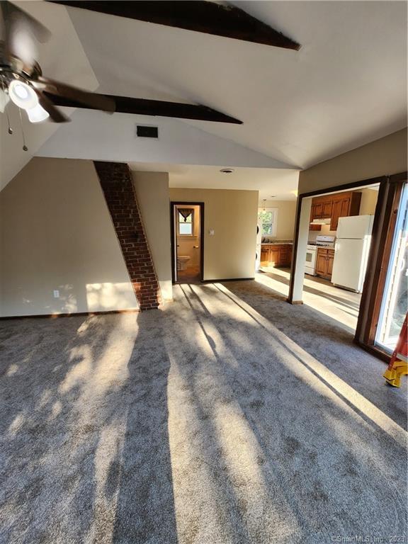 320 Lestertown Road, Unit 2 Groton, CT 06340 - Photo 1 of 1 a view of an empty room with stairs
