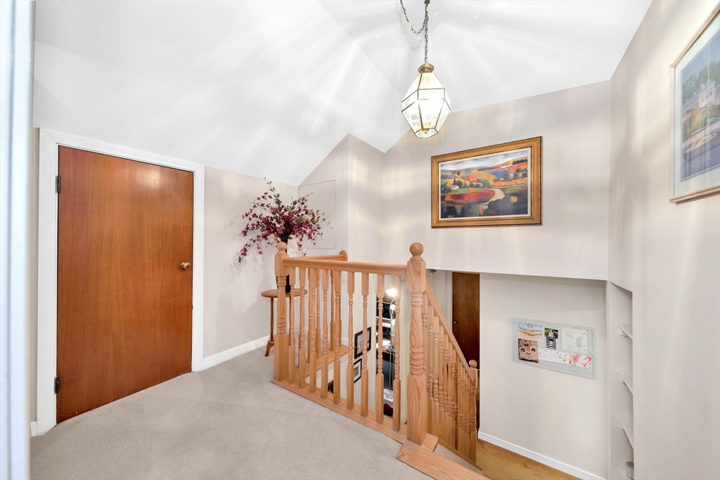 25 Kevin Road Milton, MA 02186 - Photo 13 of 39 a view of a hallway with a flower pot