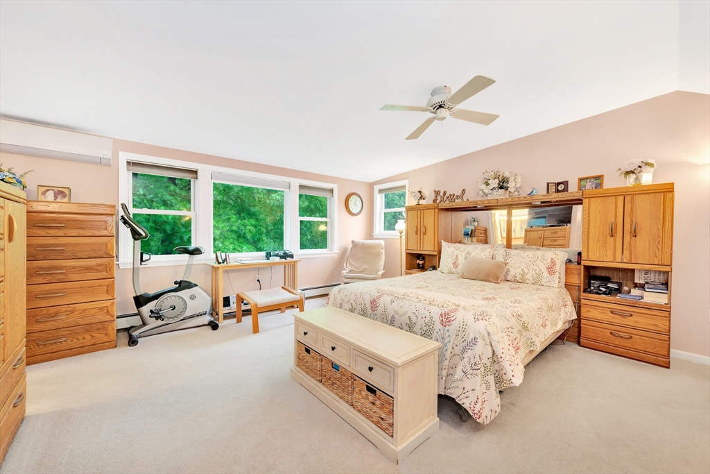25 Kevin Road Milton, MA 02186 - Photo 17 of 39 a spacious bedroom with a bed and a view of bedroom