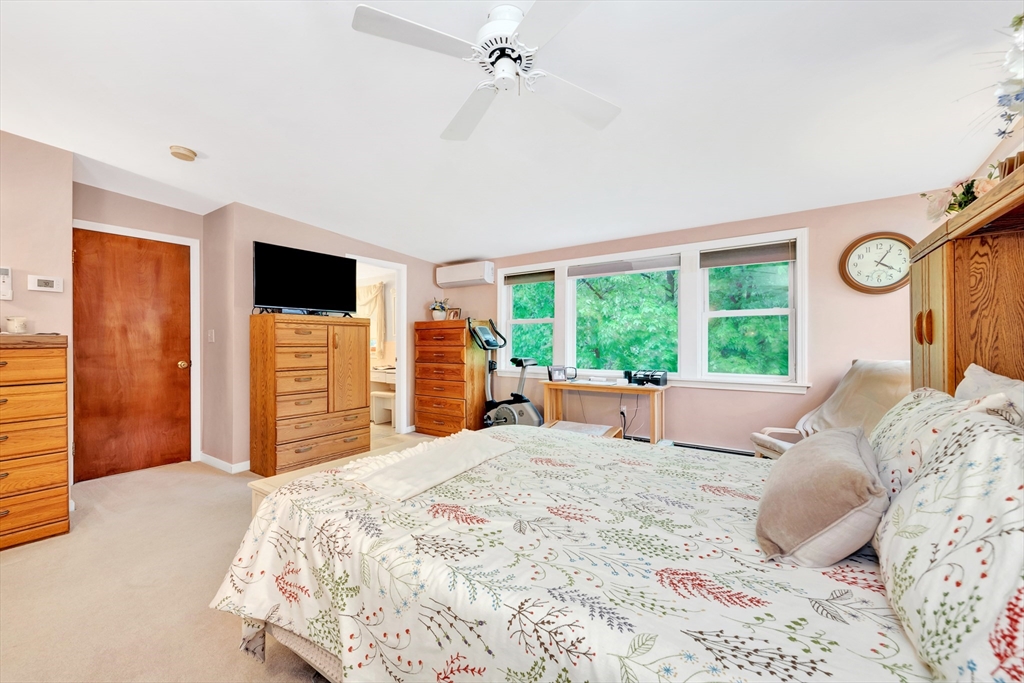 25 Kevin Road Milton, MA 02186 - Photo 18 of 39 a bed room with a bed and a television