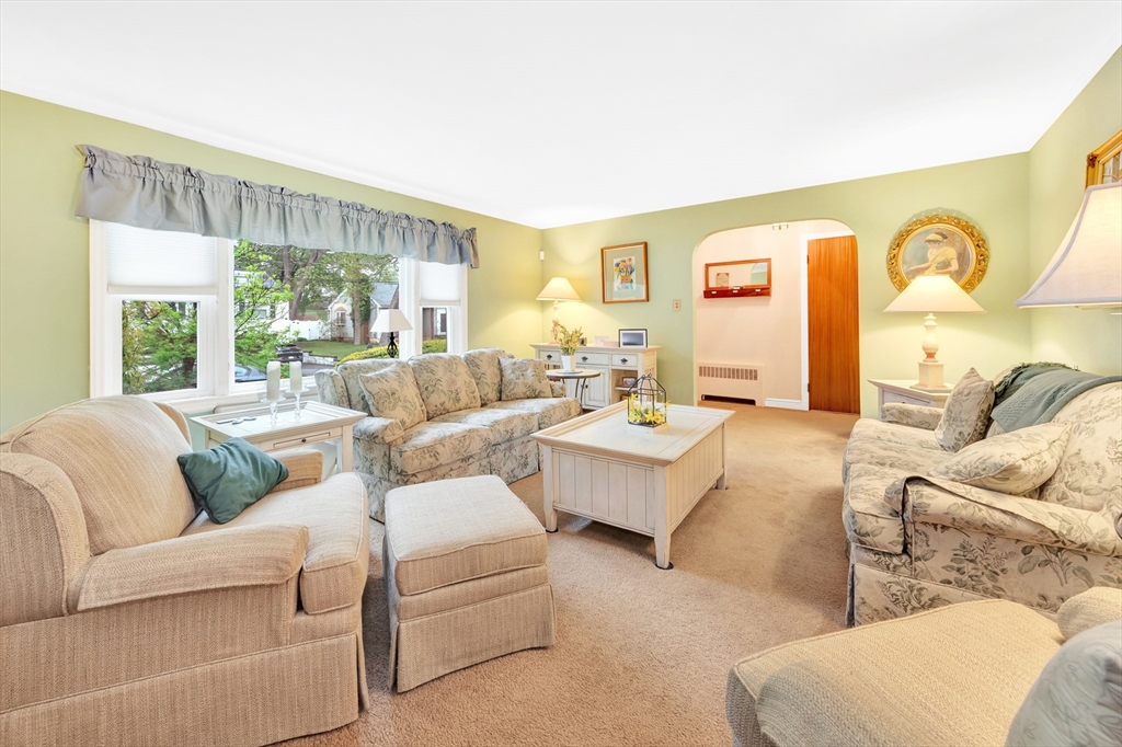 25 Kevin Road Milton, MA 02186 - Photo 24 of 39 a living room with furniture and a large window
