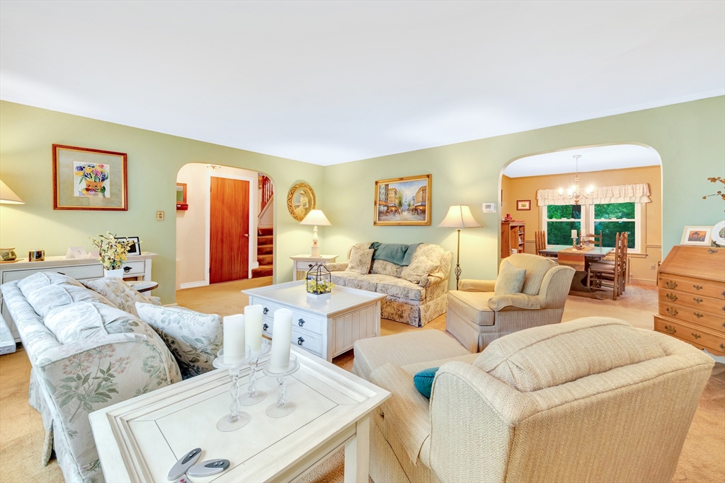 25 Kevin Road Milton, MA 02186 - Photo 25 of 39 a living room with furniture and a large window