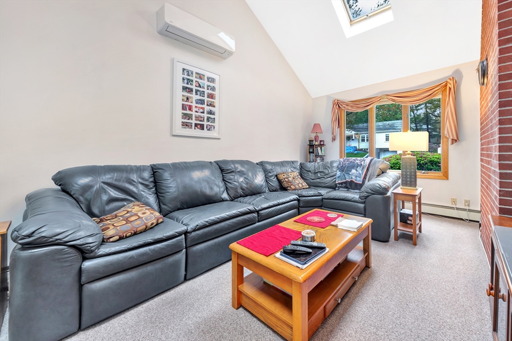25 Kevin Road Milton, MA 02186 - Photo 29 of 39 a living room with furniture and a couch