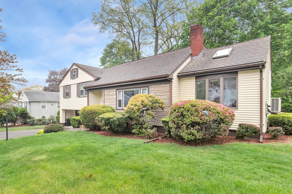 25 Kevin Road Milton, MA 02186 - Photo 3 of 39 a front view of house with yard and green space
