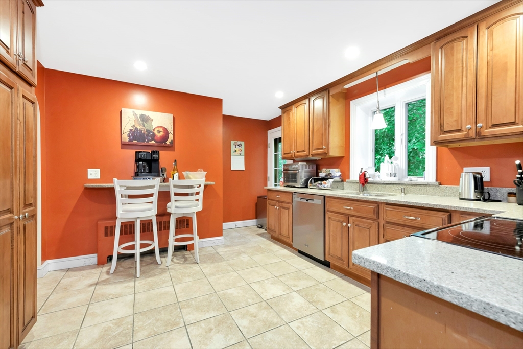 25 Kevin Road Milton, MA 02186 - Photo 31 of 39 a kitchen with a sink and cabinets