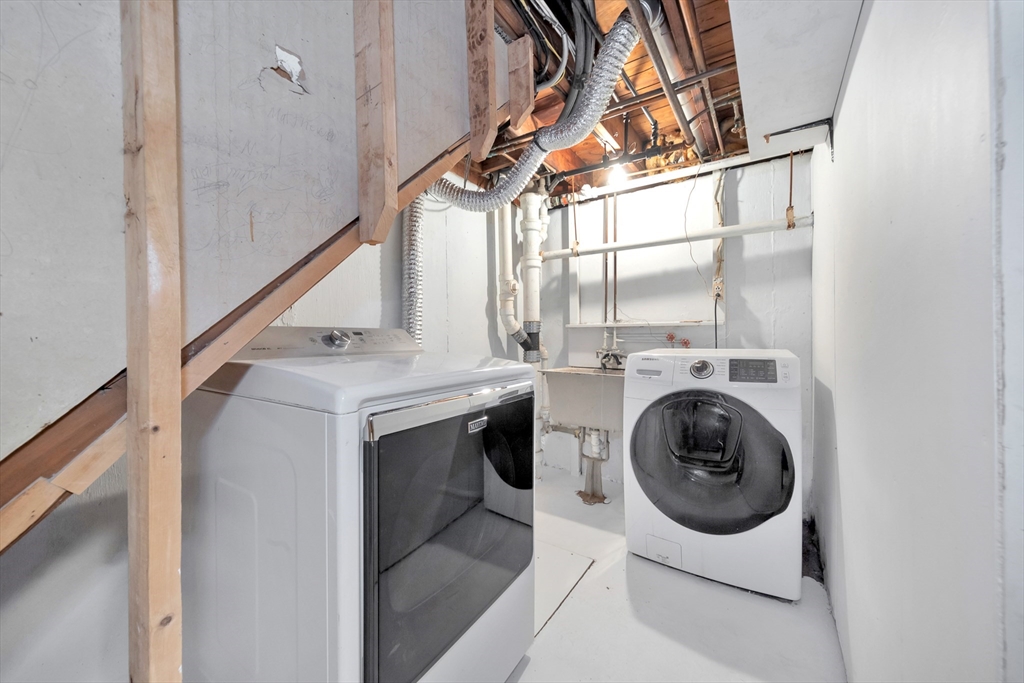 25 Kevin Road Milton, MA 02186 - Photo 38 of 39 a utility room with dryer and washer