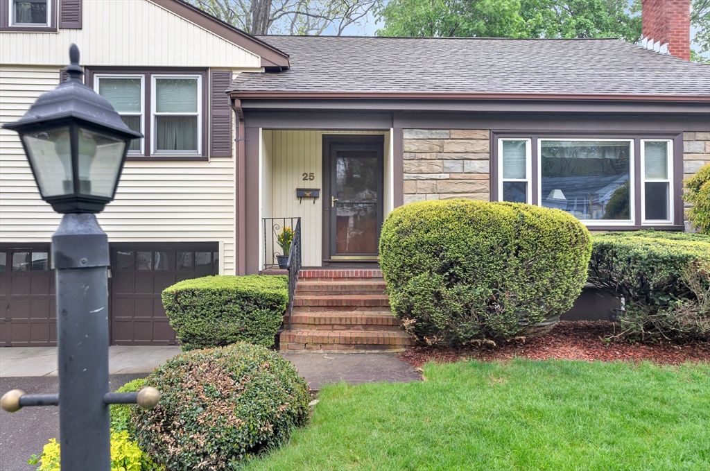 25 Kevin Road Milton, MA 02186 - Photo 4 of 39 a front view of a house with garden