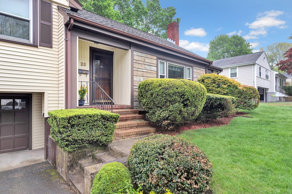 25 Kevin Road Milton, MA 02186 - Photo 5 of 39 a front view of a house with garden