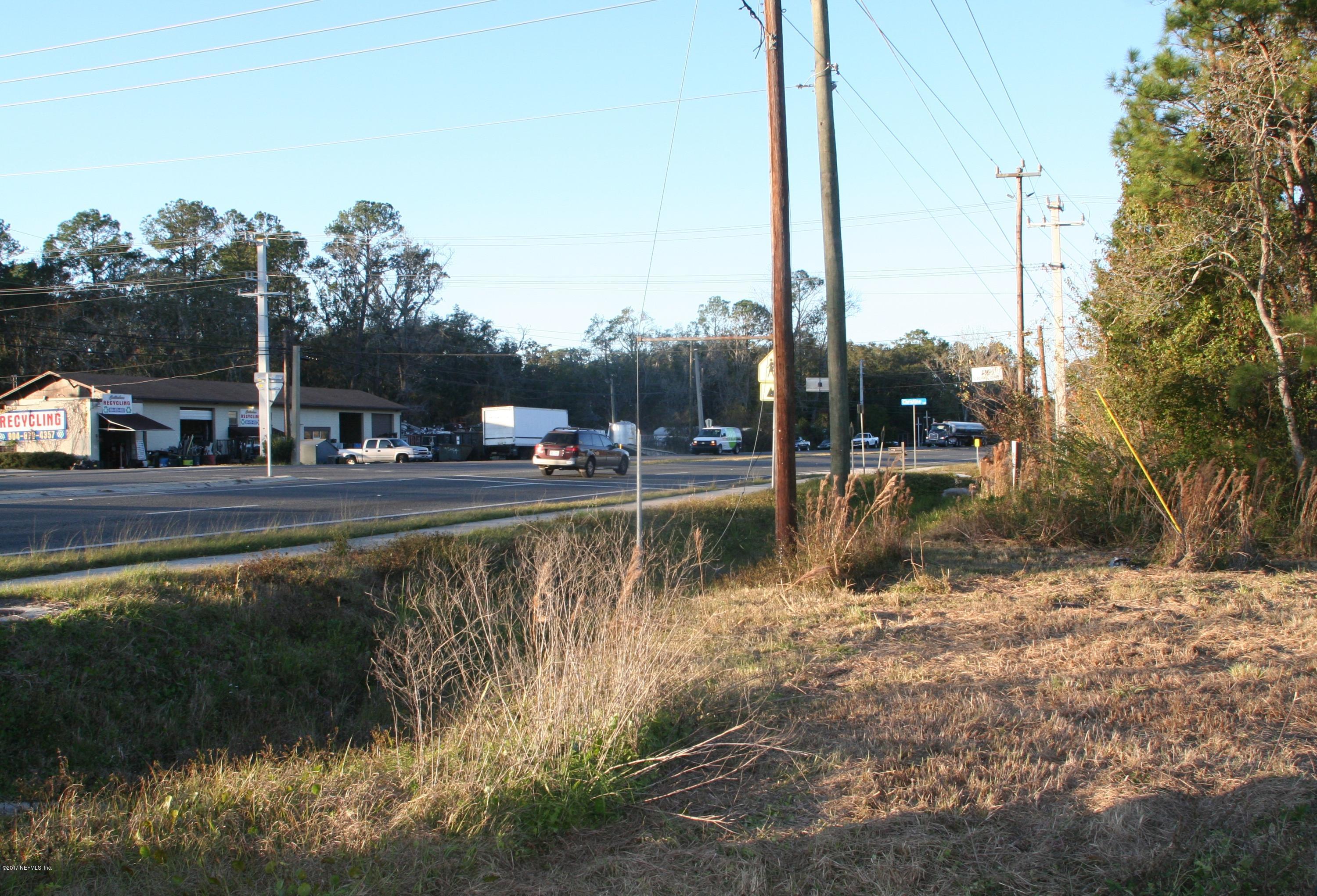 542640 Highway 1 Callahan, FL 32011 - Photo 3 of 12 a view of a lake with houses