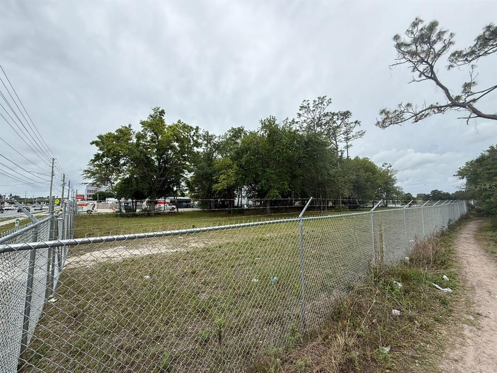 3842 South Goldenrod Road Orlando, FL 32822 - Photo 2 of 6 a view of outdoor space with lake view