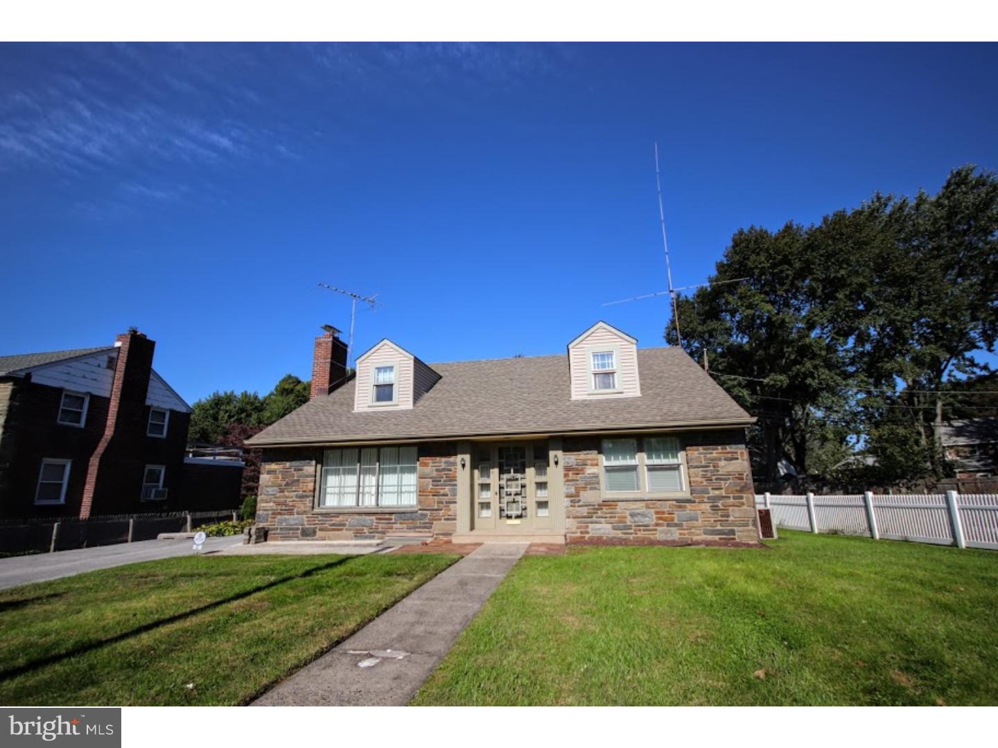 52 South State Road Springfield, PA 19064 - Photo 1 of 10 a front view of a house with a yard