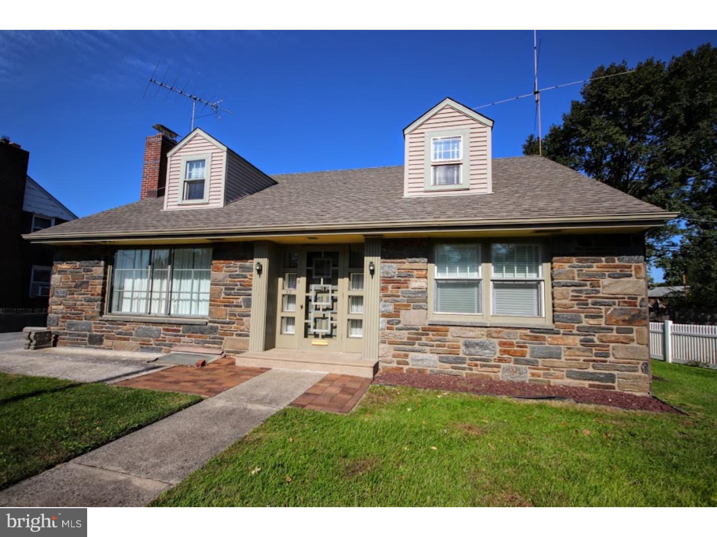 52 South State Road Springfield, PA 19064 - Photo 2 of 10 a front view of a house with a yard