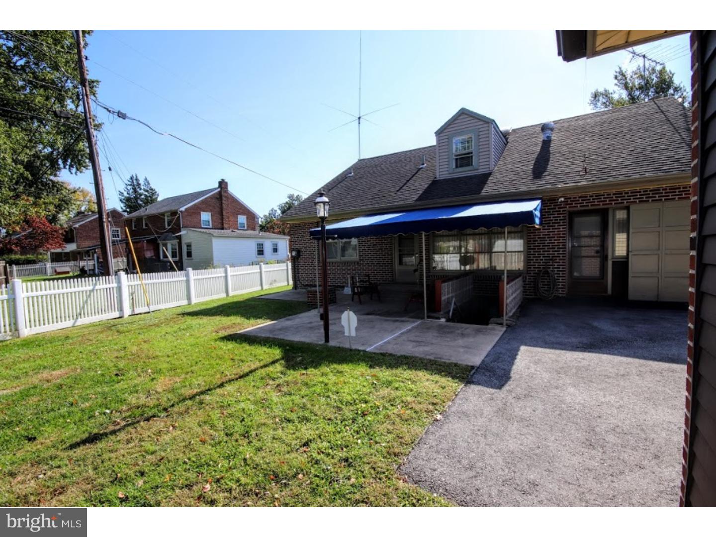 52 South State Road Springfield, PA 19064 - Photo 10 of 10 a view of a house with a backyard and a patio