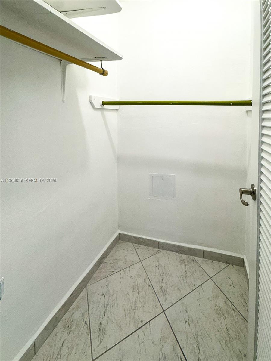 9225 Collins Avenue, Unit 609 Surfside, FL 33154 - Photo 15 of 27 a view of a small room