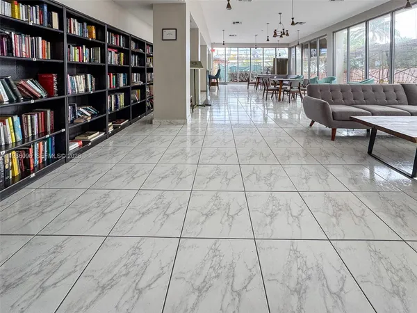 a view of a palm tree in front of a building