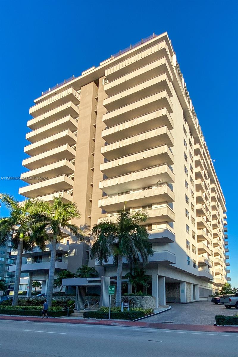 9225 Collins Avenue, Unit 609 Surfside, FL 33154 - Photo 4 of 27 a front view of a building